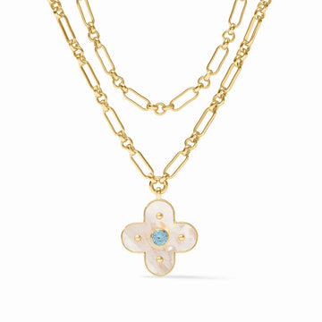 Julie Vos 24K gold-plated layered chain necklace featuring a mother of pearl clover pendant with a central CZ stone.