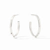 A pair of polished silver hoop earrings with small, evenly spaced round pearl-like beads set along the front, displayed on a clean white background.