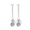 Silver Justice cross earrings with St. Christopher medal charms
