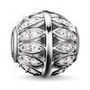 Karma Bead Bead Leaves: Silver charm bead with leaf-shaped detailing and sparkling accents.
