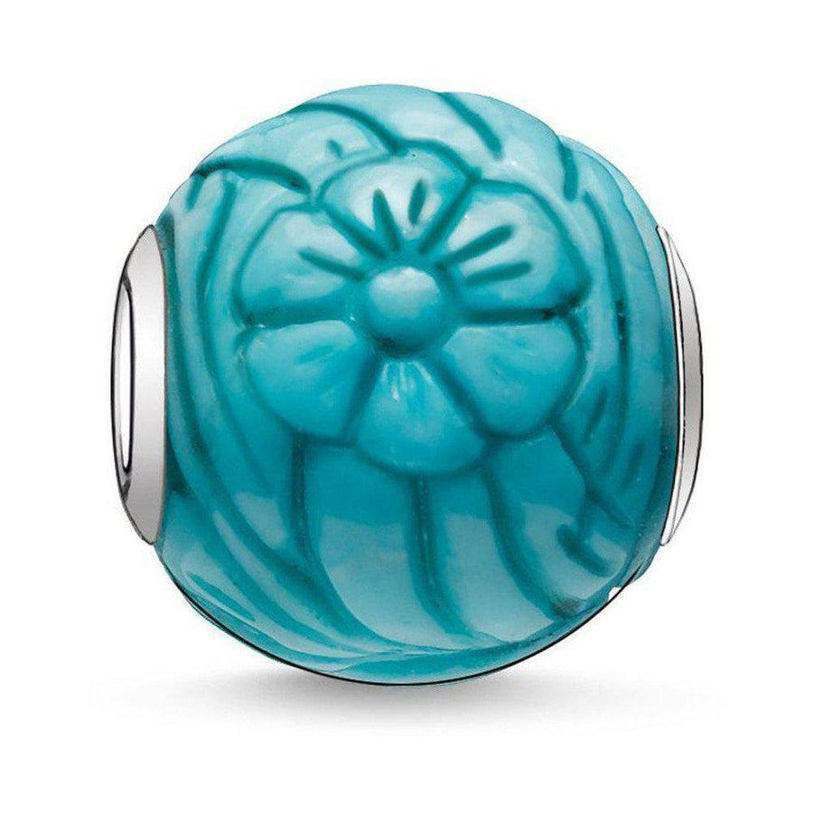Karma Bead Sunflower: Teal turquoise flower bead with silver accents.
