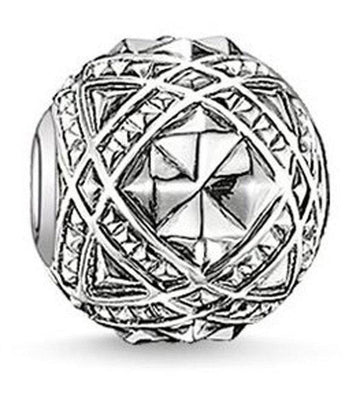 Silver Karma Bead Zig Zag charm with intricate geometric design.
