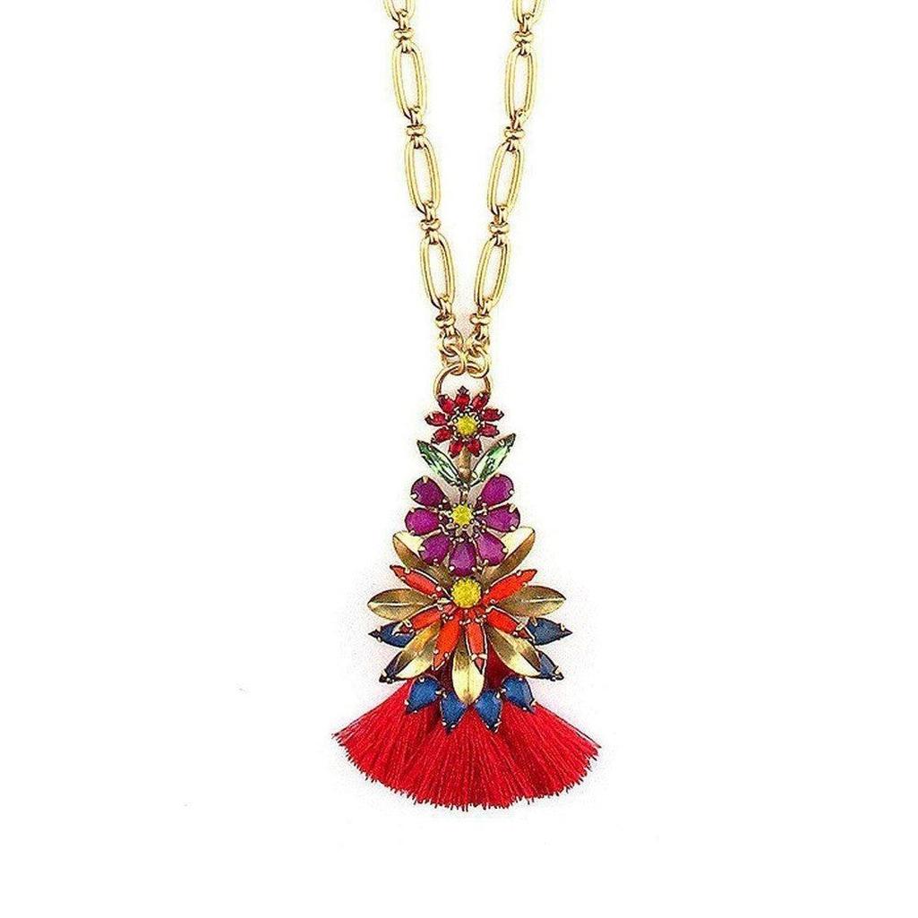 Kingsley pendant necklace: gold chain, red tassel, colorful floral multi-gemstone statement piece.
