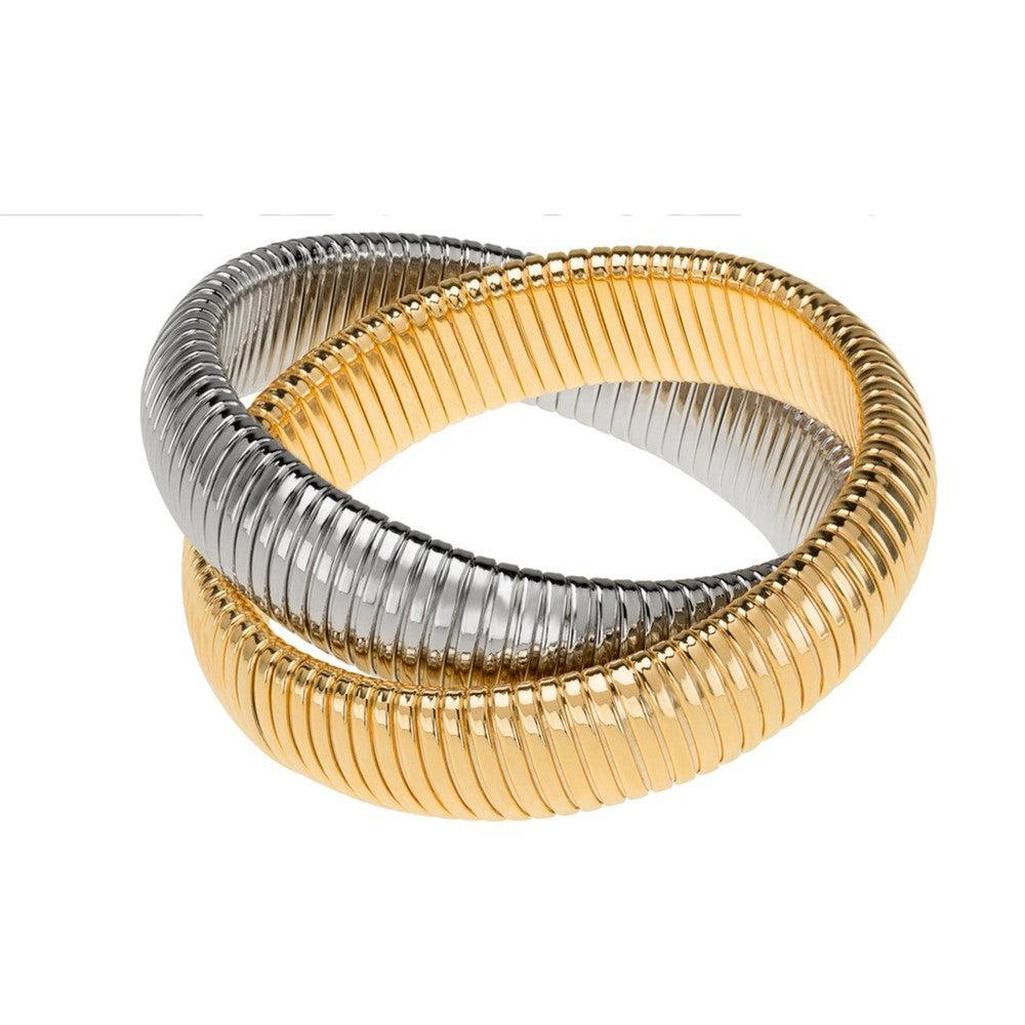 Double Cobra bracelet in gold and rhodium, ribbed design.
