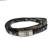 Black leather wrap bracelet with floral print and silver clasp.
