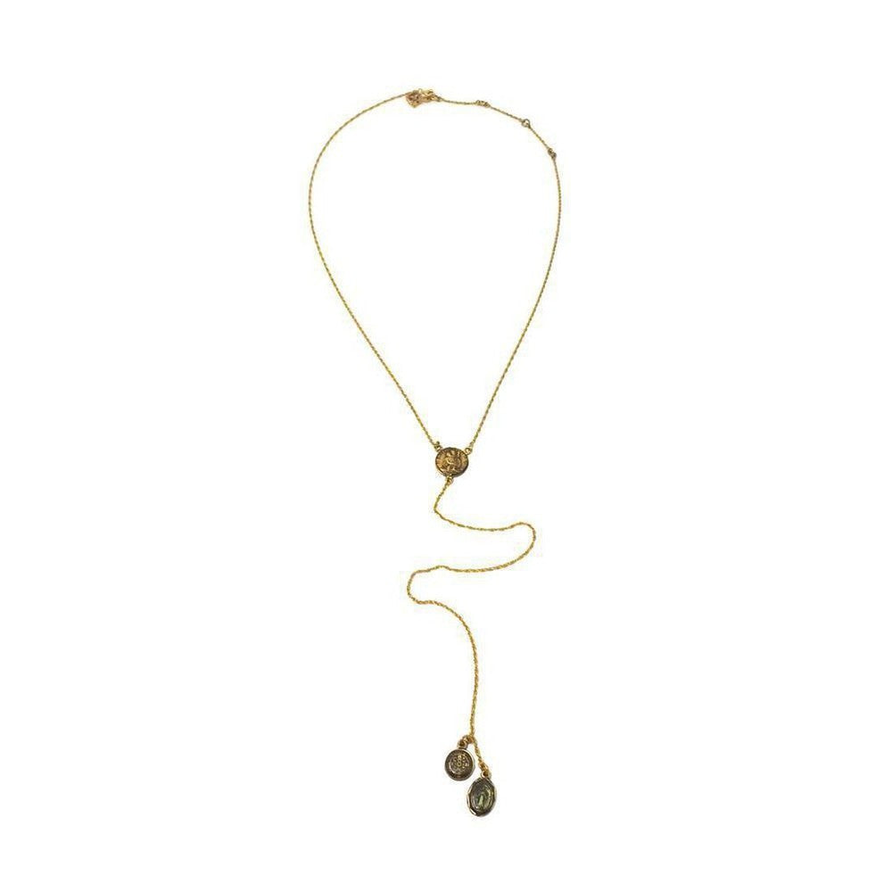 Gold lariat necklace with circular medallions; features a longer chain and smaller accents.
