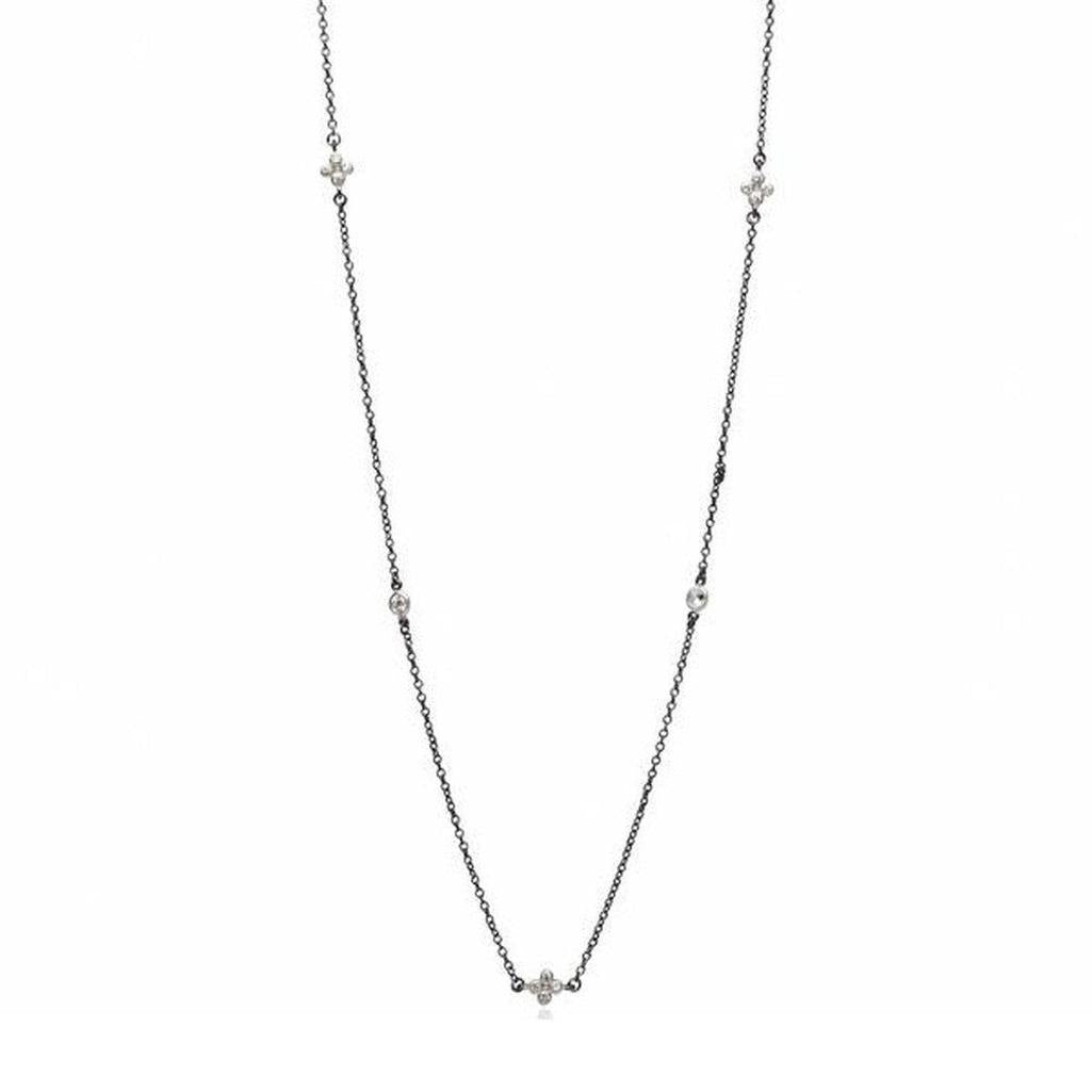 Little Sweet Star necklace: Delicate black chain, sparkling diamond accents.
