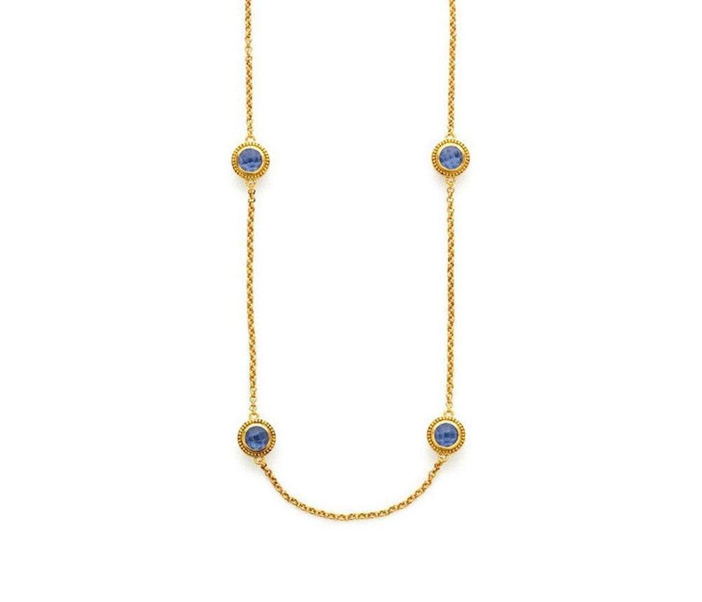 Loire Station Necklace: Gold chain with three blue sapphires.
