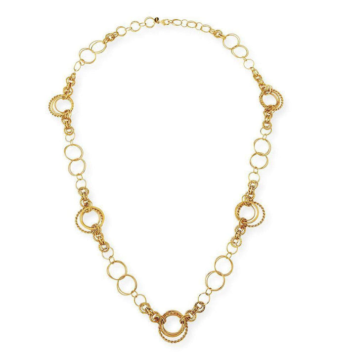 Long gold link necklace with decorative circle accents
