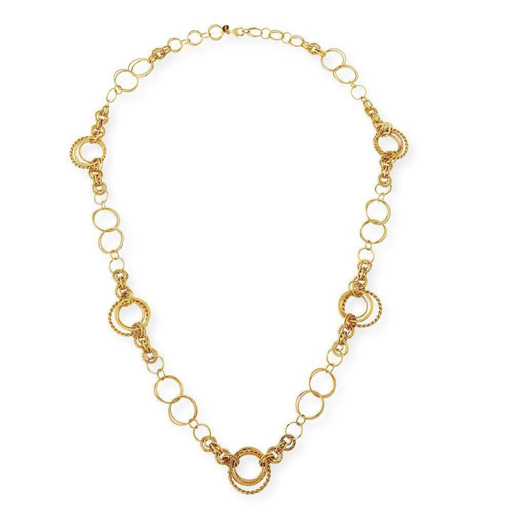Long gold link necklace with decorative circle accents
