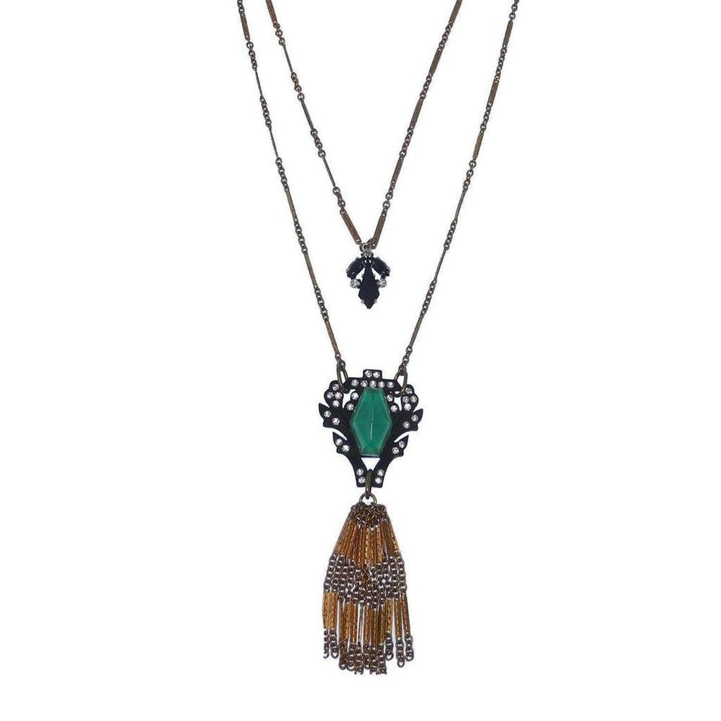 Lucid Tassel Necklace: Double-strand necklace with green stone, gold tassel, and black accents.
