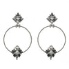 Lucy in the Sky crystal and silver hoop earrings with unique geometric design.
