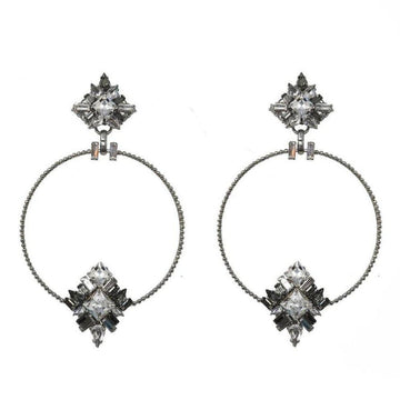 Lucy in the Sky crystal and silver hoop earrings with unique geometric design.
