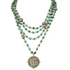 Lux 4mm Turquoise Magdalena necklace: 4-strand turquoise bead & gold chain with medallion pendant.
