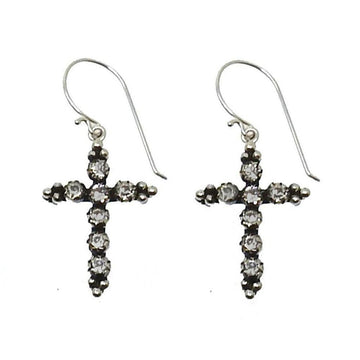 Silver cross earrings adorned with sparkling stones.
