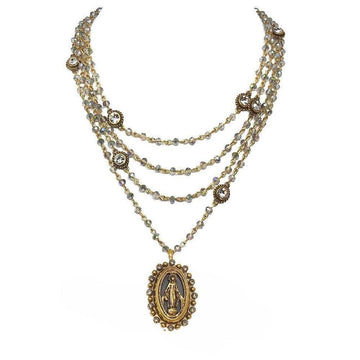 Multi-strand necklace featuring a Virgin Mary pendant, gold accents, and iridescent beads.
