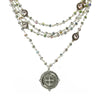 Magdalena Silver Blue Lagoon necklace: multi-strand silver chain with iridescent crystals & St. Jude medal pendant.
