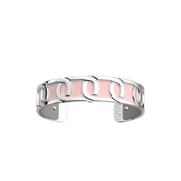Silver cuff bracelet with pale pink leather inlay and link design.
