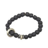 Black beaded meditation bracelet with silver accents for mindful moments.
