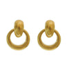 Gold doorknocker clip earrings, medium round design.
