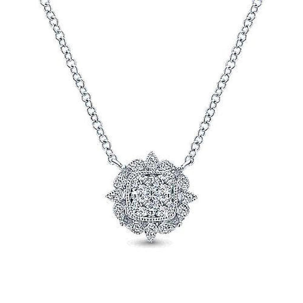 Milgrain diamond pendant necklace with a square-cut cluster of diamonds in a floral setting.
