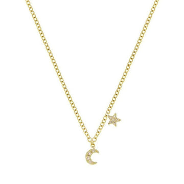 Mini Moon & Star necklace in yellow gold with sparkling accents.
