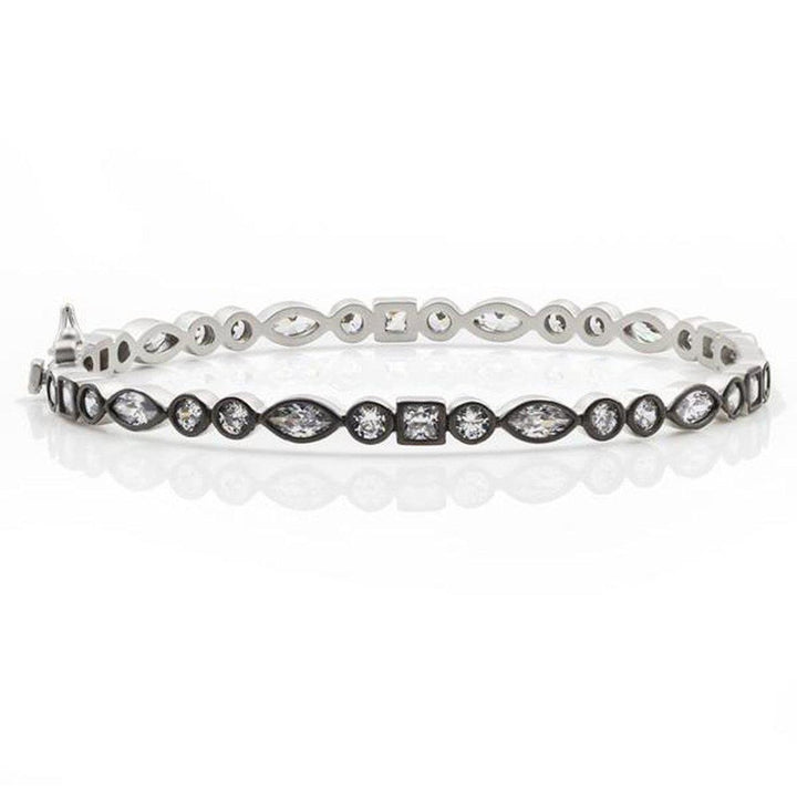 Silver mixed shape bangle featuring marquise, round, and square-cut cubic zirconia stones.
