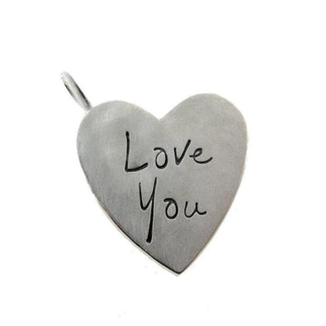 Silver heart pendant with "Love You" inscribed, perfect Mother's Day gift.
