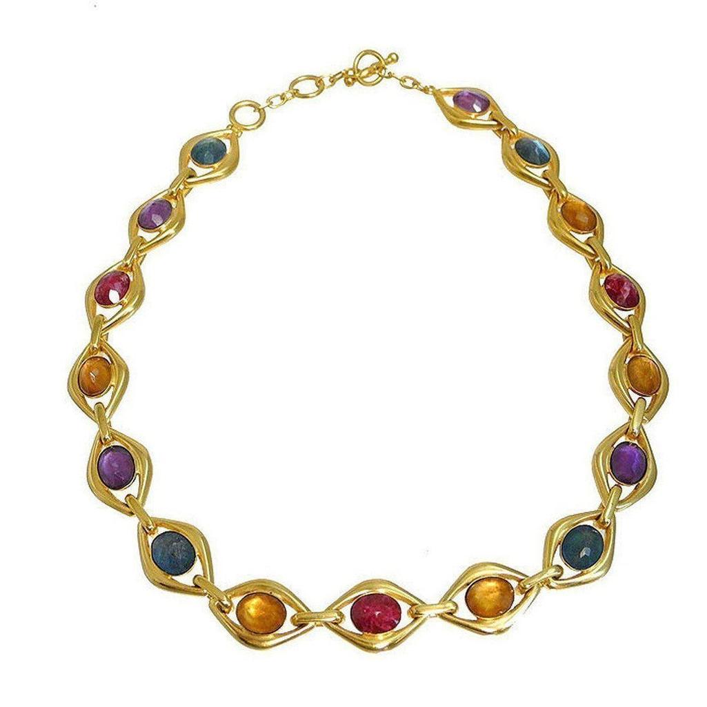 Gold multi-stone link necklace with purple, ruby, and amber cabochons.
