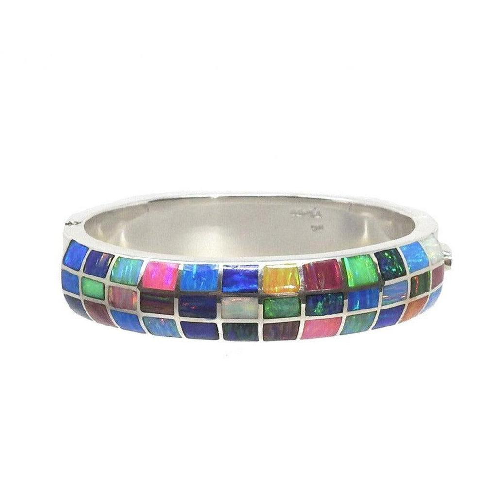 Multi-stone inlaid sterling silver cuff bracelet with colorful opal mosaic design.
