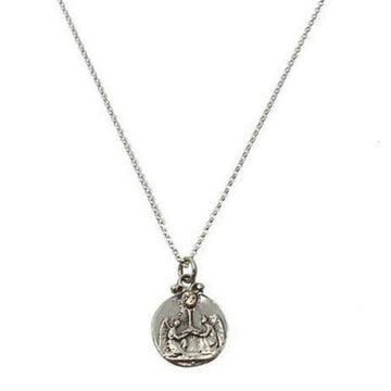 Silver necklace featuring a circular charm with angel detail.
