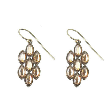 Bronze drop earrings with faceted stones arranged in a floral pattern.
