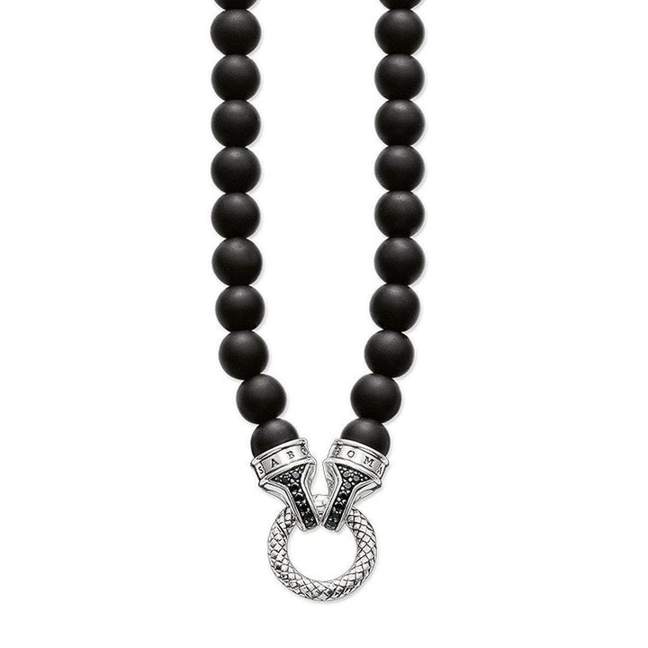 Black onyx bead necklace with silver pendant clasp featuring black stones.
