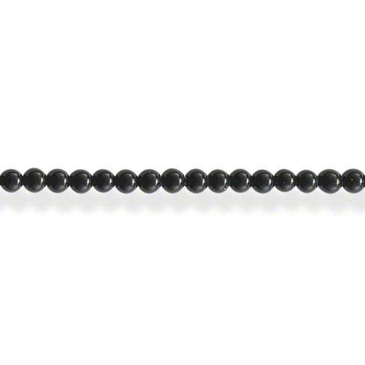 Sleek black onyx bead necklace on white background
