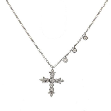 Diamond cross pendant necklace with three bezel accents on delicate chain.
