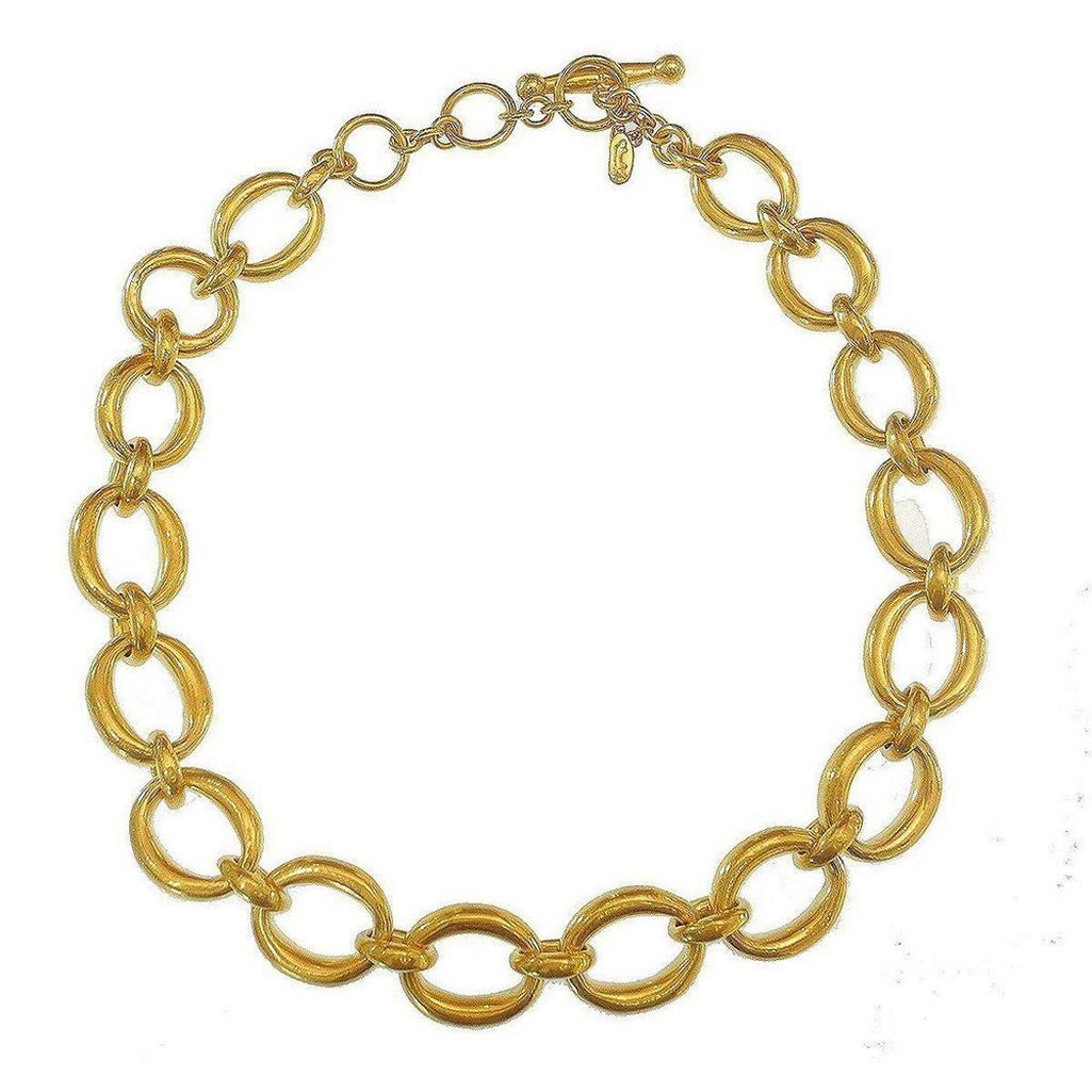 Gold oval link chain necklace; statement piece.
