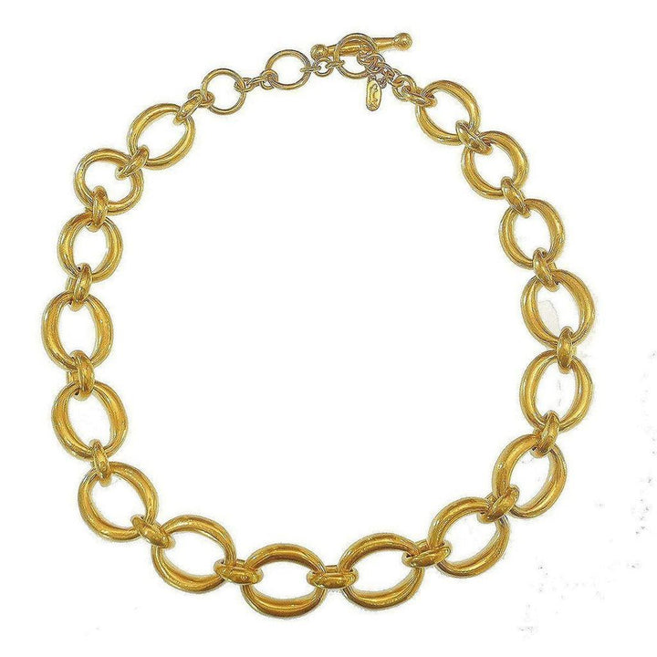 Gold oval link chain necklace; statement piece.
