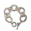 Silver oval chain link bracelet with a toggle clasp.
