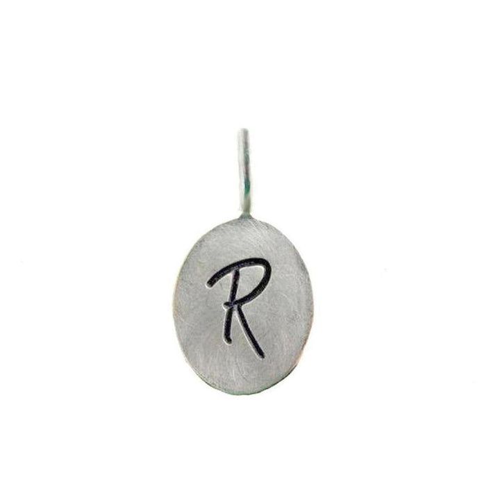 Silver oval letter pendant with initial R
