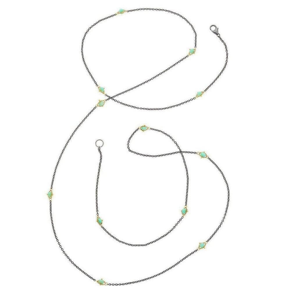 Oxidized silver long necklace with 18k gold and turquoise accents.
