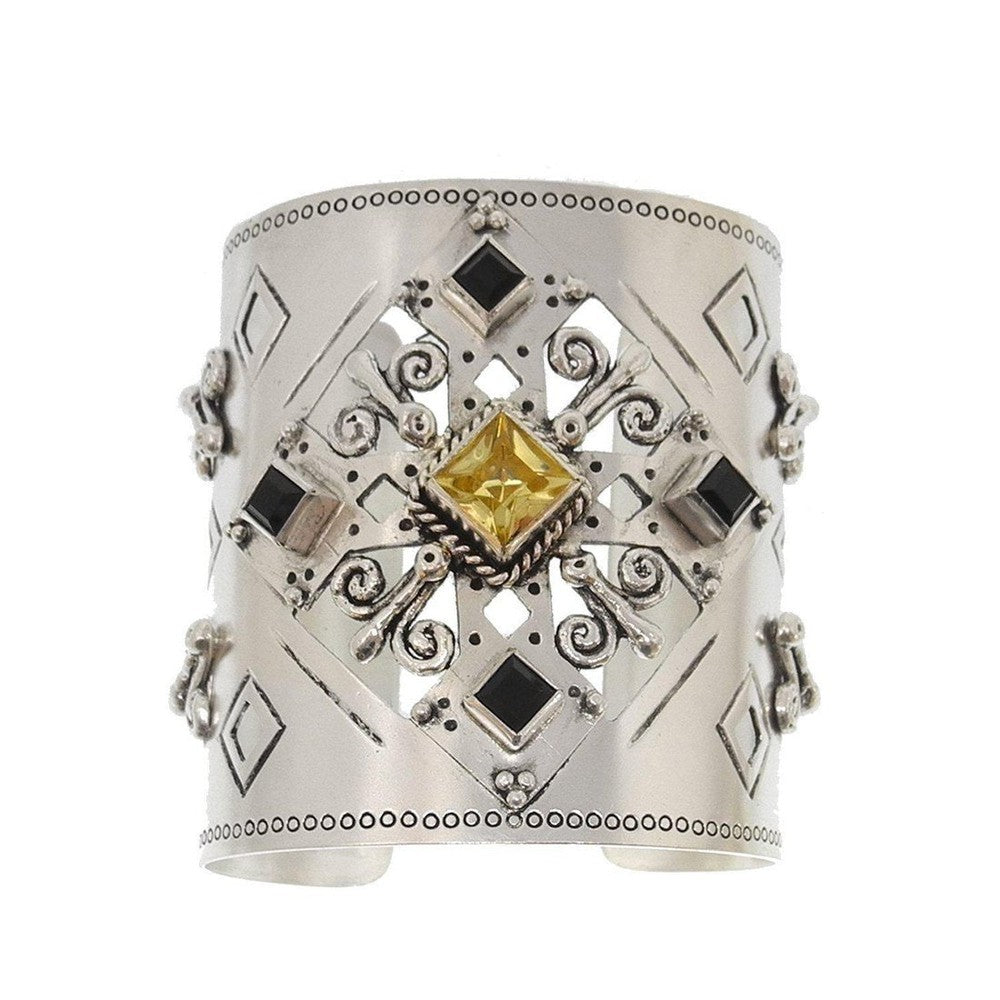 Silver Paloma Cross Cuff bracelet with yellow and black gemstones
