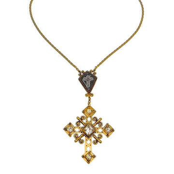Gold cross necklace with clear gemstones and a dark gray cameo featuring a smaller cross.
