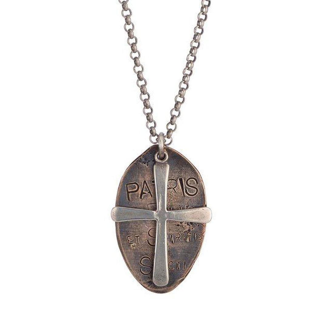 Patris necklace: Bronze oval pendant with silver cross, engraved details, on a silver chain.
