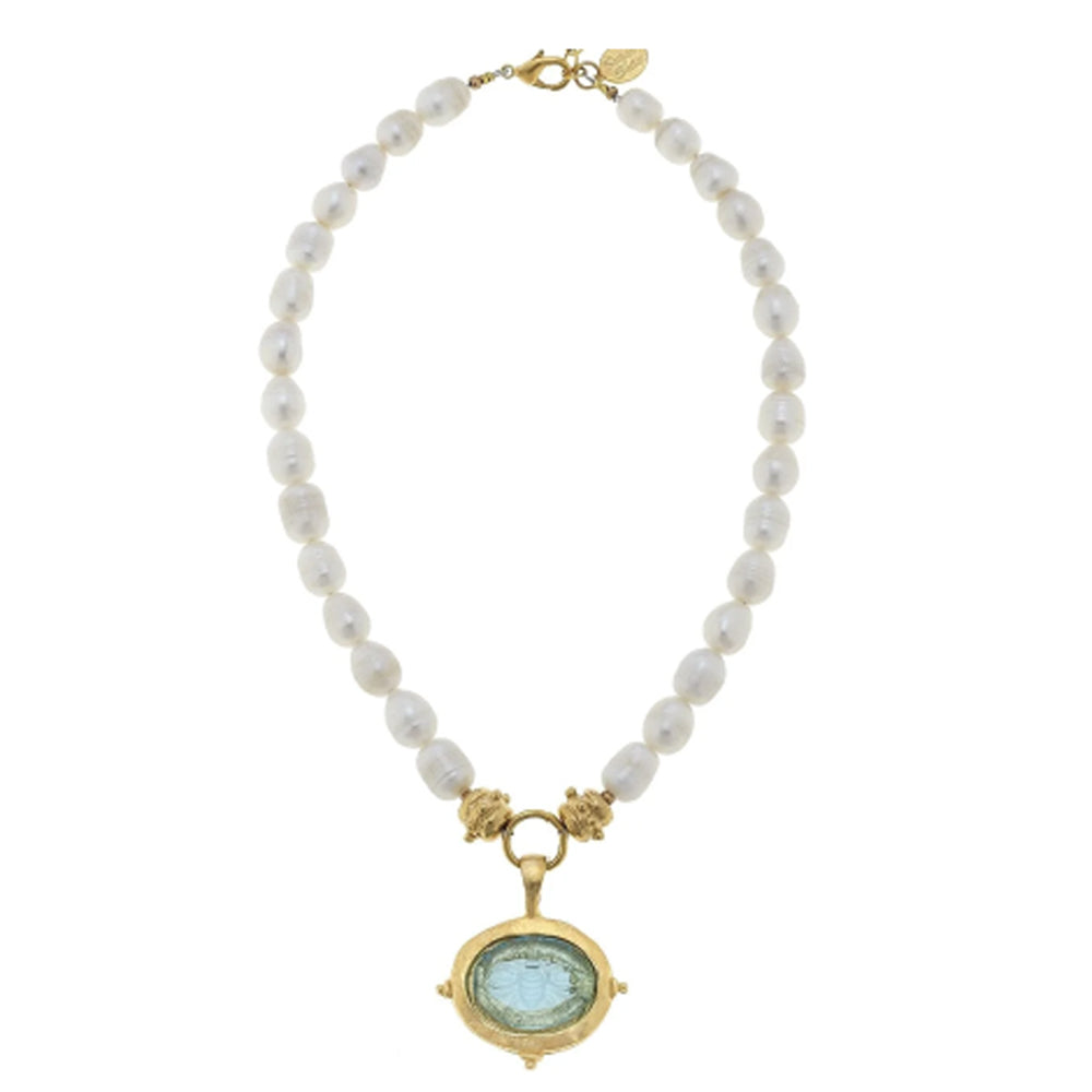 Aqua Venetian glass bee intaglio pendant on a 15-inch freshwater pearl necklace with gold-plated accents.