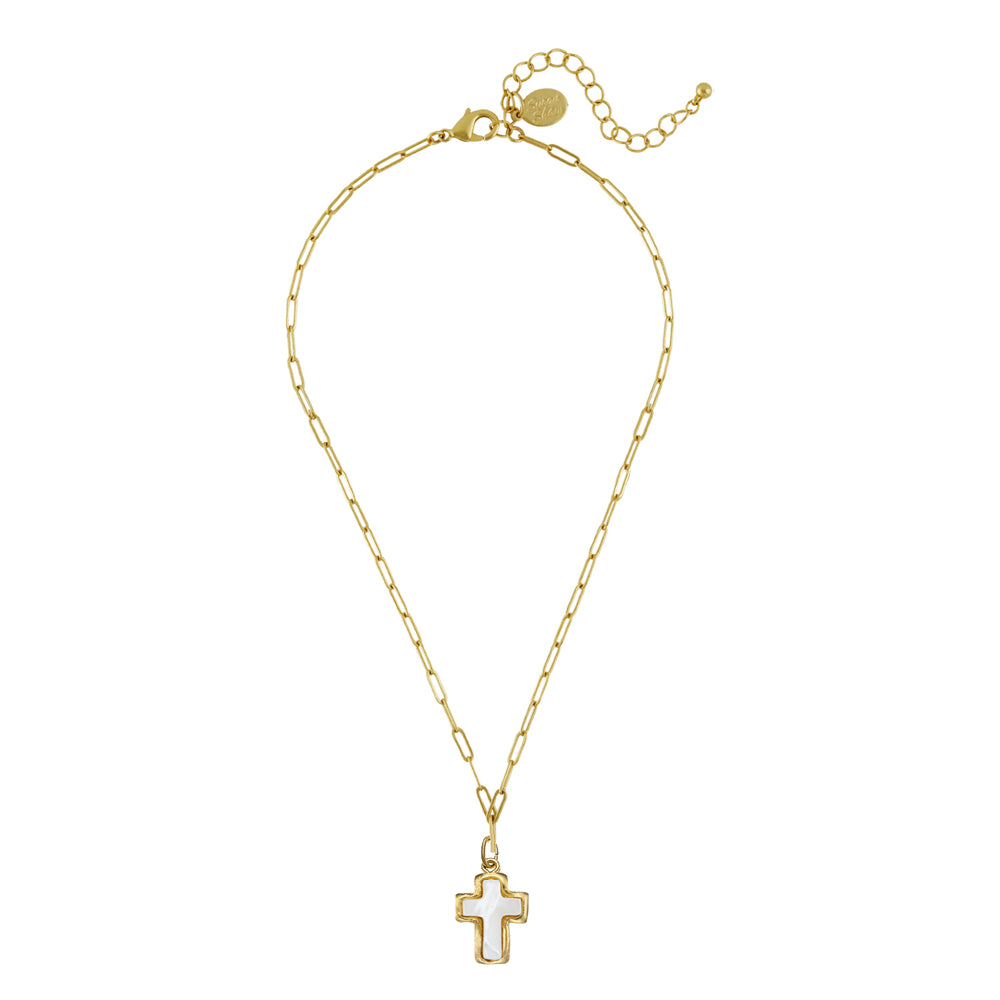 Gold paperclip chain necklace featuring a white mother of pearl cross pendant in a gold bezel with a toggle closure.