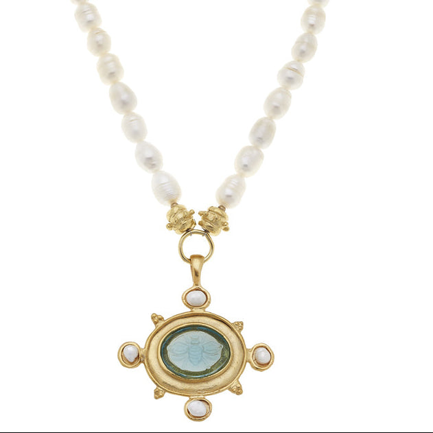 Aqua Venetian glass bee intaglio pendant on a genuine freshwater pearl necklace with gold-plated accents.