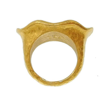 Gold statement ring, size 6.5, with a textured, wave-like design.
