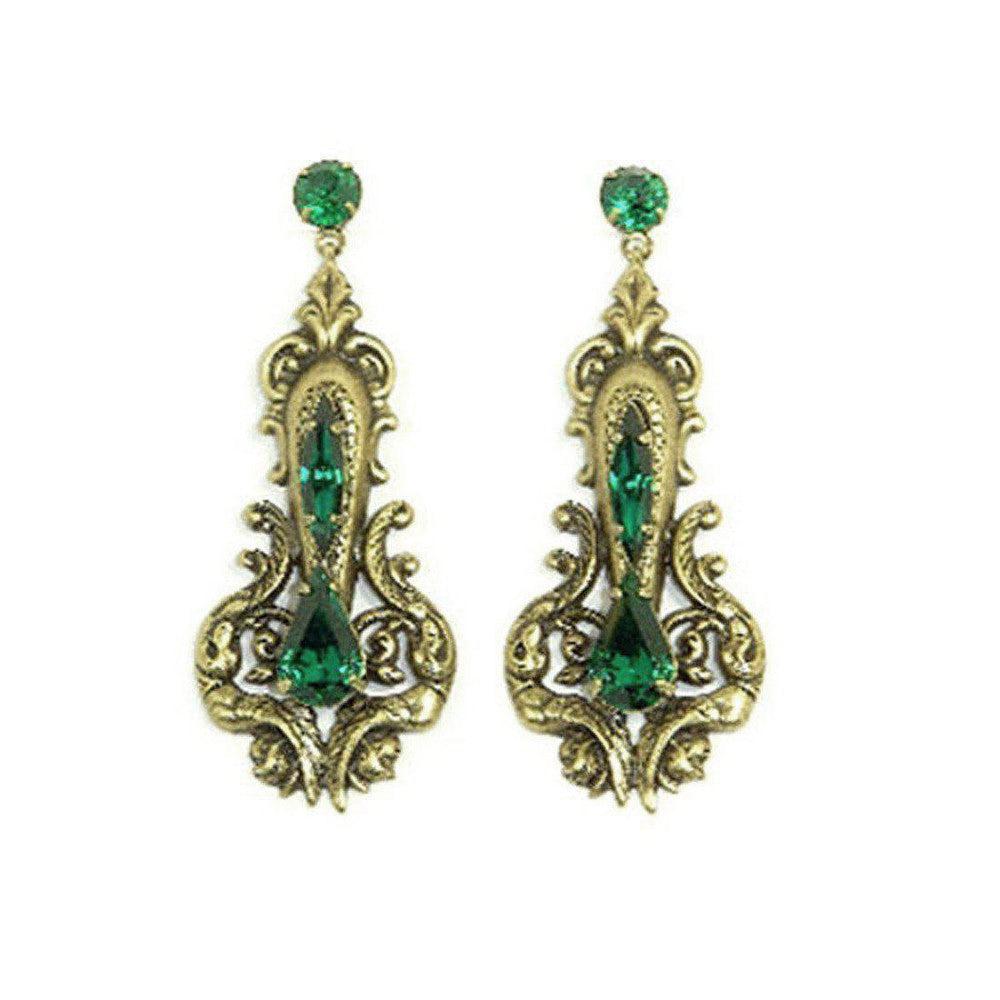 Auden Remy earrings: antique gold filigree, emerald green crystal accents.

