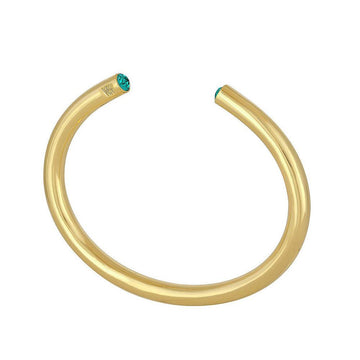 Gold birthstone bangle bracelet with turquoise accents
