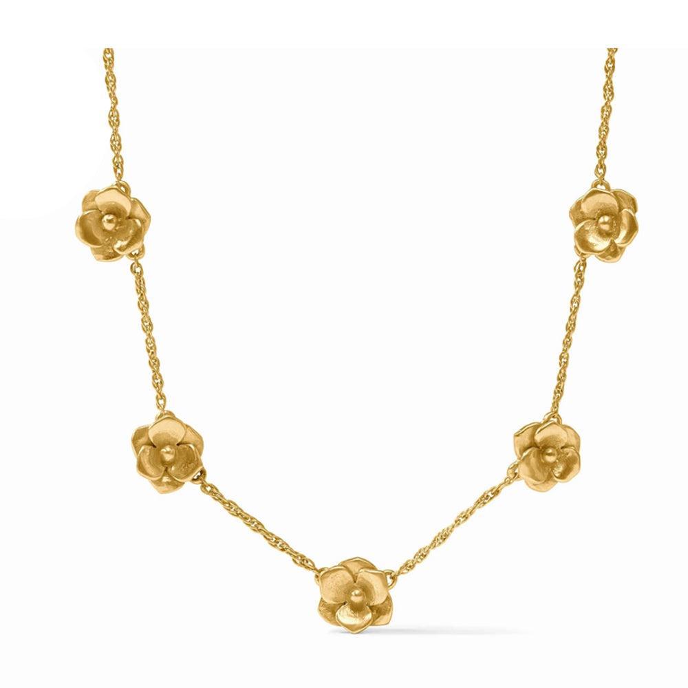 Gold Bloom Delicate Station necklace with five floral accents
